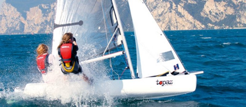 Two crew sailing a Topper Topaz